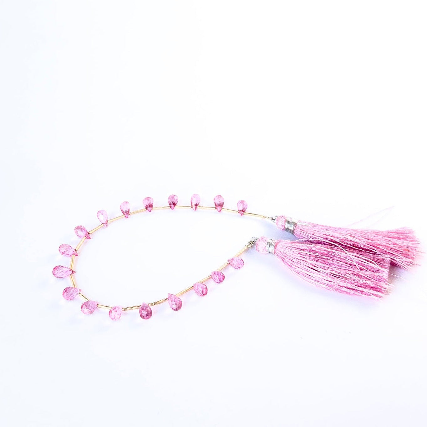 Genuine Pink Topaz stone beads with bright shine and tapered briolette shape for DIY jewellery making.