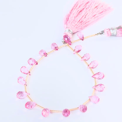 Smoothly faceted Pink Topaz briolettes with vivid colour and elegant drop shape for artisan jewellery designs.

