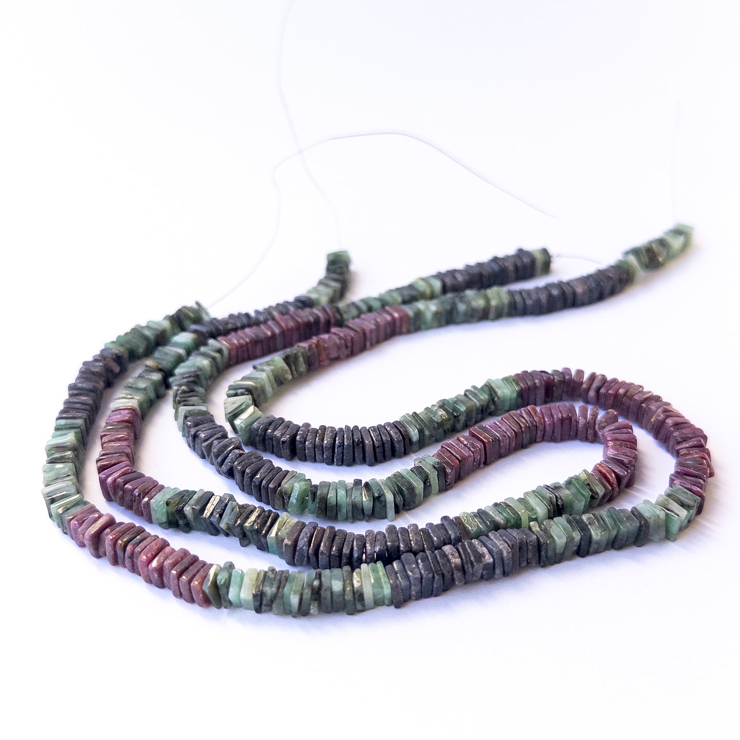 Genuine ruby, sapphire and emerald stone beads with polished smooth square heishi shaping for DIY jewellery.
