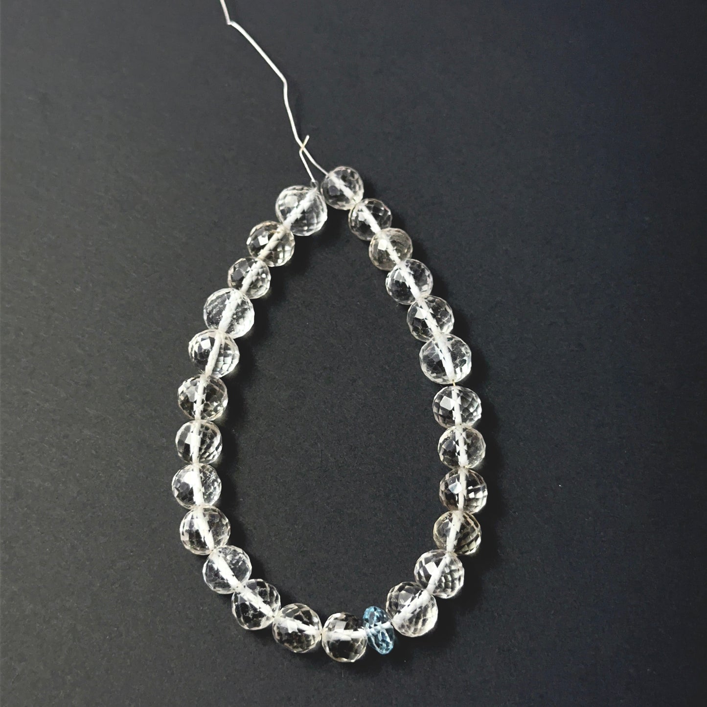 Soft pink rose quartz and cool aquamarine faceted round beads, 7–8mm, arranged in a 25‑piece set for handmade jewellery components.