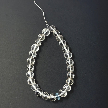 Soft pink rose quartz and cool aquamarine faceted round beads, 7–8mm, arranged in a 25‑piece set for handmade jewellery components.
