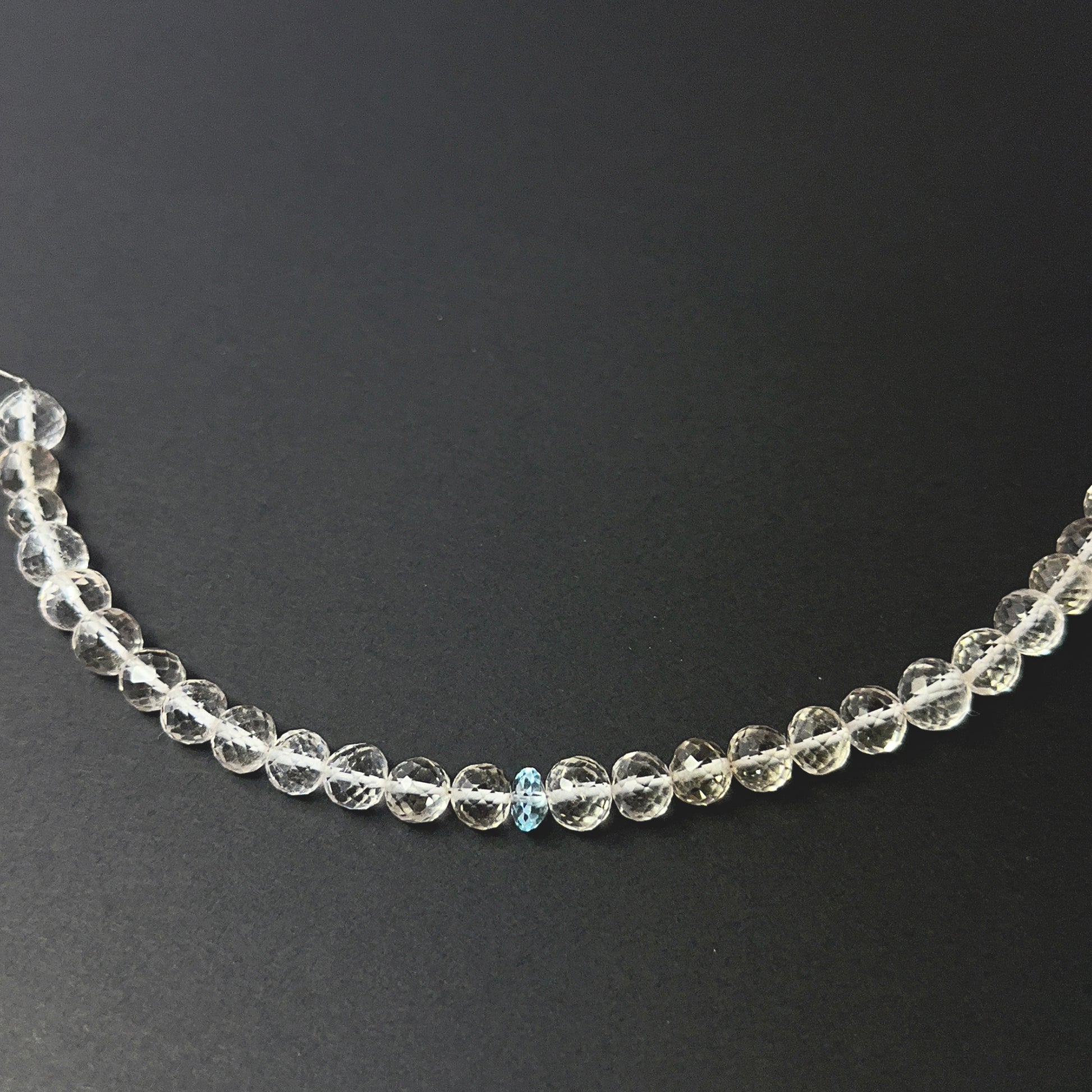 Authentic mixed rose quartz and aquamarine beads in faceted round cut, showcasing colour contrast and quality polish.