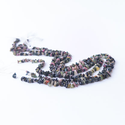Multi Tourmaline chips and nuggets displaying vibrant colours and natural texture in a detailed strand.