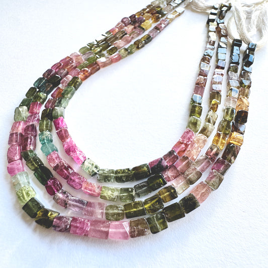 Multi Tourmaline rectangle beads in smooth finish, arranged on a 31cm strand with vibrant natural colours.