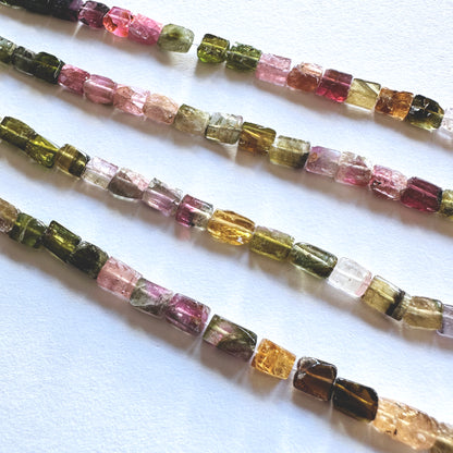 Strand of Multi Tourmaline smooth rectangle natural stone beads.
