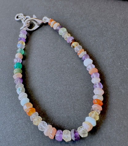 Elegant multi gemstone bracelet crafted from natural gemstone beads, 4.3–4.5mm faceted rondelles, adjustable 17.5cm length.