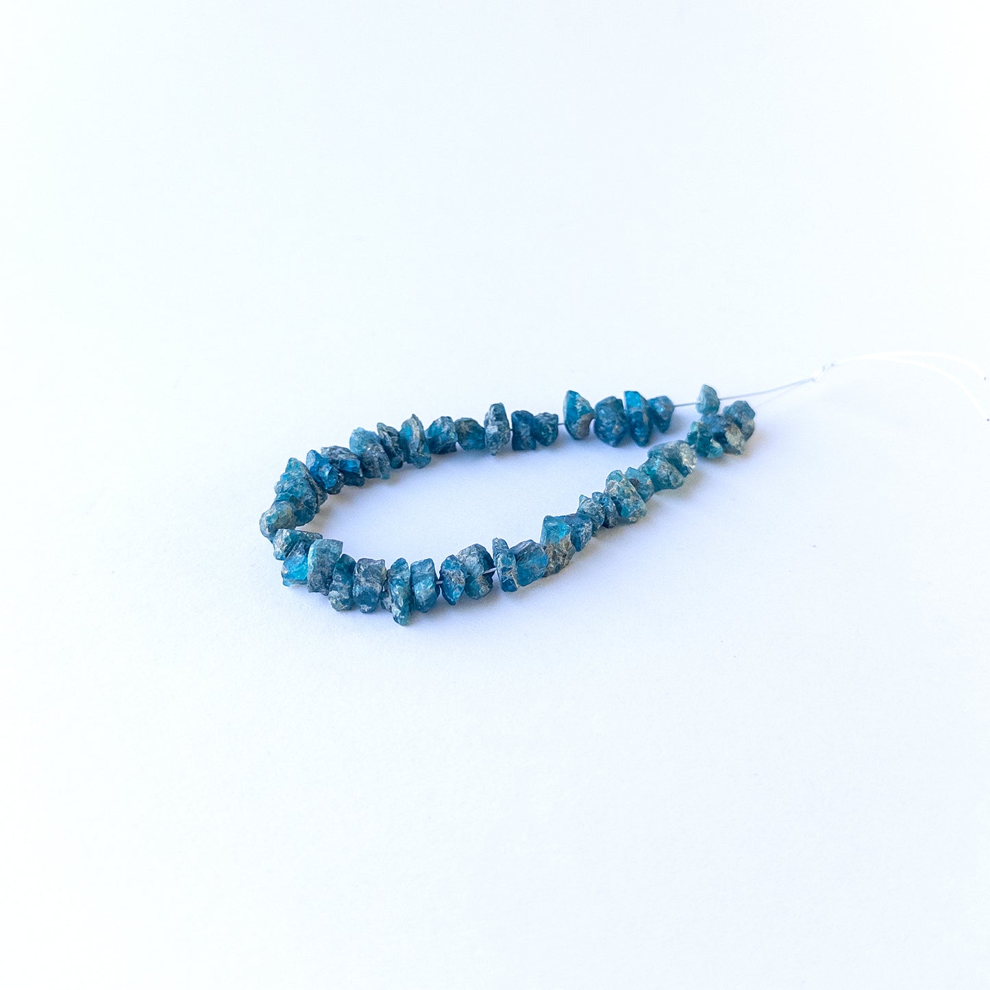 Genuine Neon Apatite stone beads with natural rough texture and bright colour ideal for DIY jewellery making.