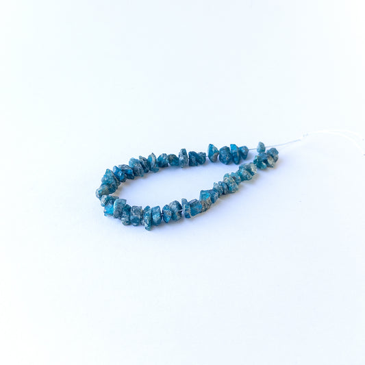 Genuine Neon Apatite stone beads with natural rough texture and bright colour ideal for DIY jewellery making.