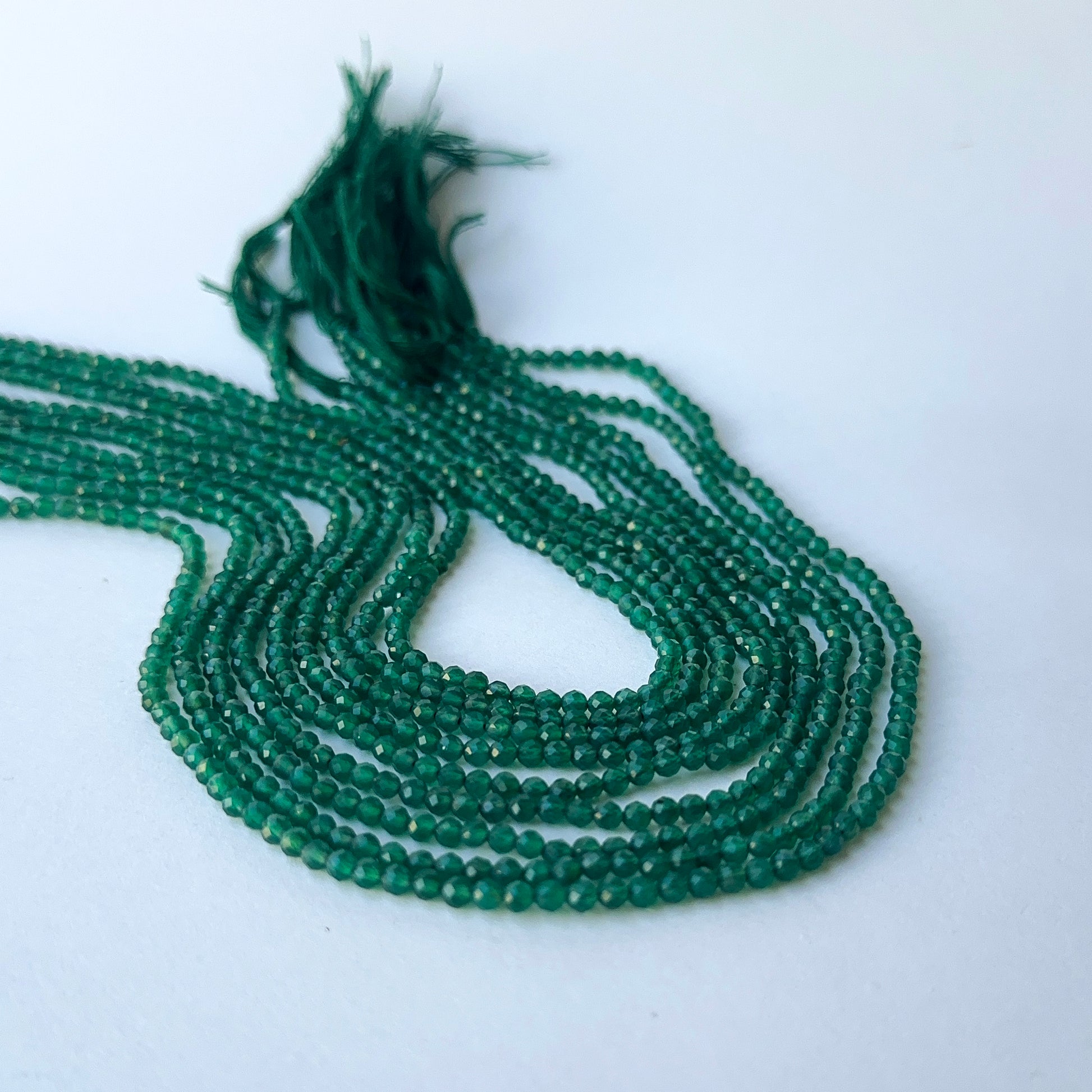 Onyx faceted rondelle beads in 3.1mm size on a 31cm strand, showcasing genuine gemstone sparkle for handmade jewellery.