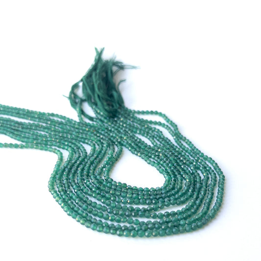 Green Onyx faceted rondelle gemstone beads in 3.1mm size on a 31cm strand for DIY jewellery making.