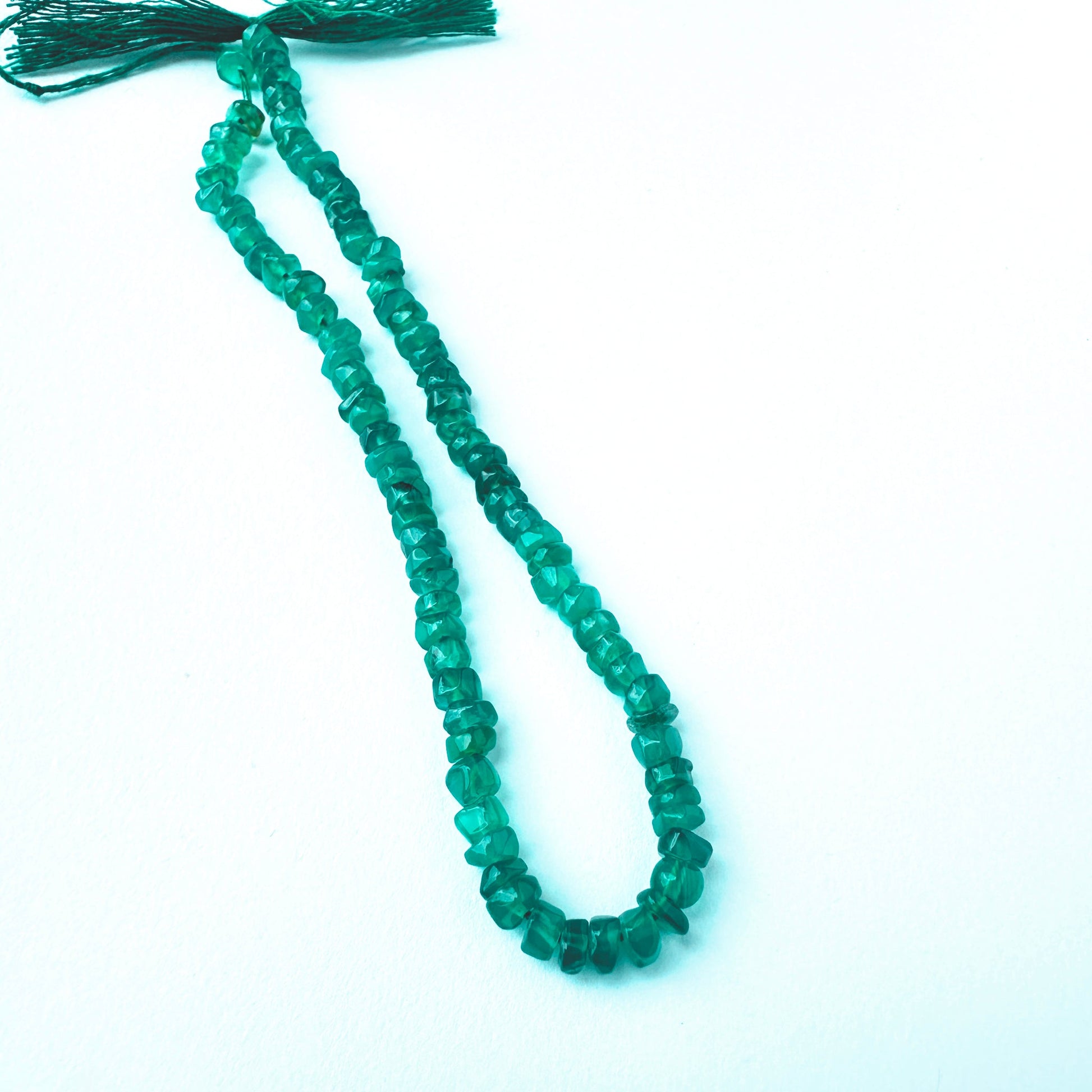 Handmade jewellery components featuring Onyx beads with consistent size and lustrous finish.