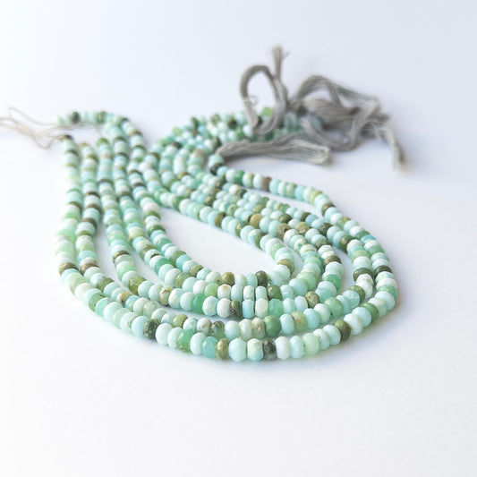 Green Opal faceted rondelle gemstone beads in 5.1–5.2mm size on a 33cm strand for DIY jewellery.