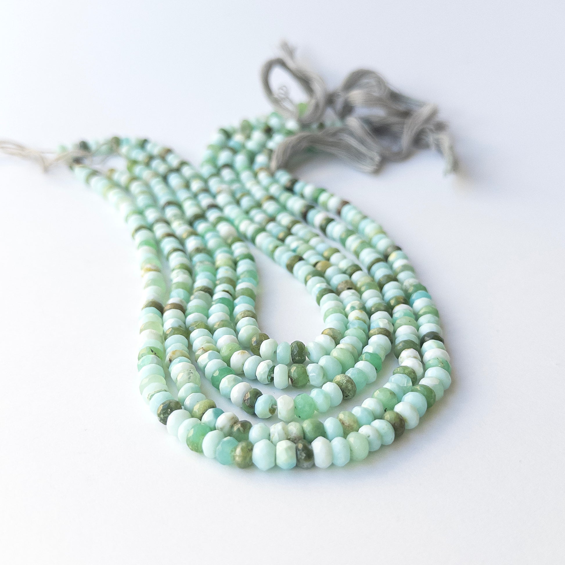 Genuine Mint Green Opal stone beads with crisp faceting and soft pastel tones for handmade jewellery.