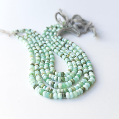 Genuine Mint Green Opal stone beads with crisp faceting and soft pastel tones for handmade jewellery.