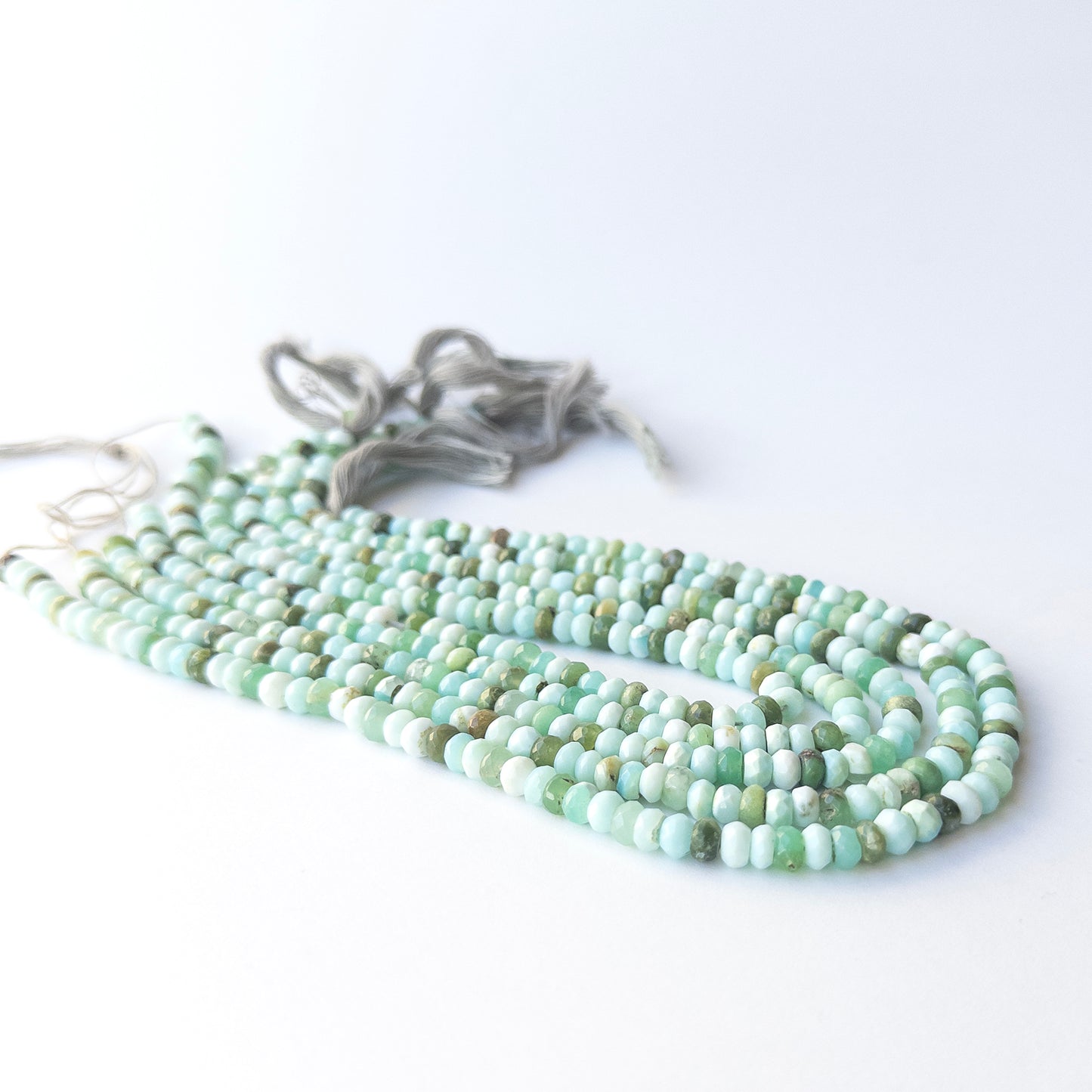 Authentic Mint Green Opal gemstone beads showing subtle shimmer and sparkle for artisan beadwork.