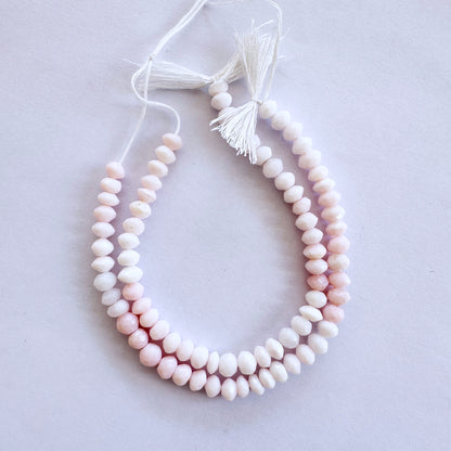 Opal faceted rondelle beads in 5.5-6mm size with soft pastel tones on a 16cm strand for elegant jewellery designs.