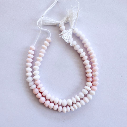 Opal faceted rondelle beads in 5.5-6mm size with soft pastel tones on a 16cm strand for elegant jewellery designs.