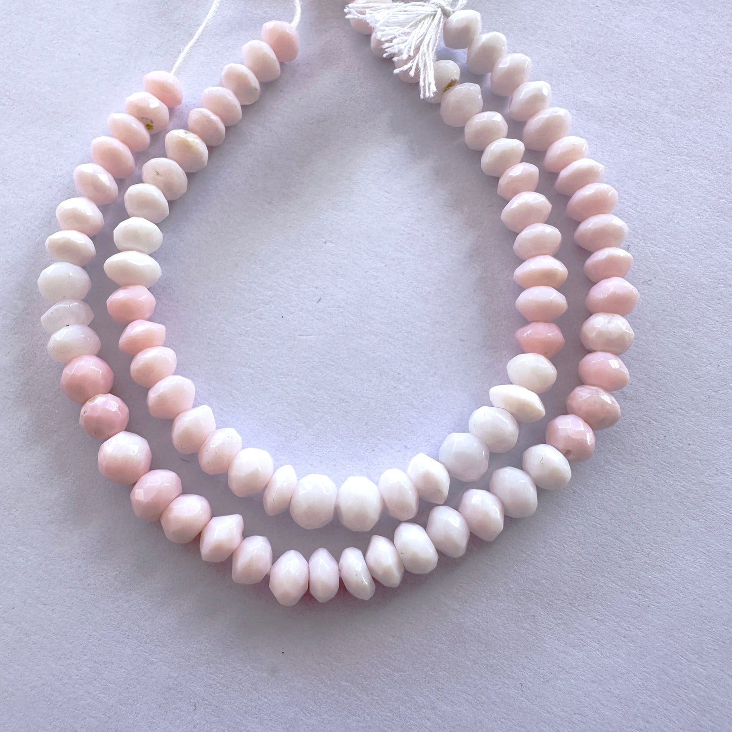 Faceted Opal beads in 5.5-6mm size arranged in a neat 16cm strand with radiant shine.