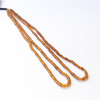 Genuine Opal gemstone beads in smooth rondelle shape, displaying polish, colour, and natural beauty for jewellery crafting.