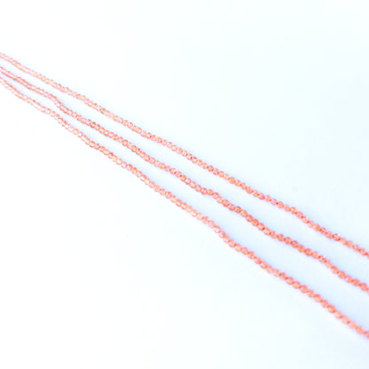Handmade jewellery components featuring authentic Orange Chalcedony faceted rondelle beads with warm sparkle.