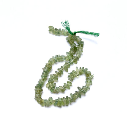 Iridescent Labradorite stone beads in smooth oval cut, displaying soft shimmer for jewellery designers.