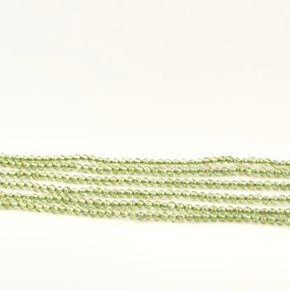 Authentic Peridot gemstone beads, 2.1–2.2mm faceted rondelles with bright green sparkle for DIY jewellery makers.