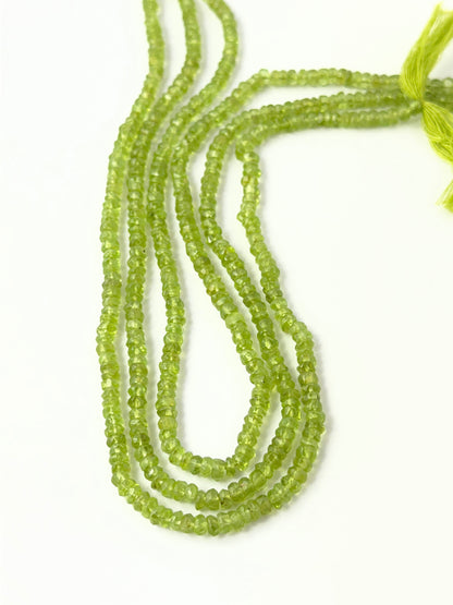Handmade jewellery components featuring natural Peridot gemstone beads with crisp faceting and vibrant green tones.