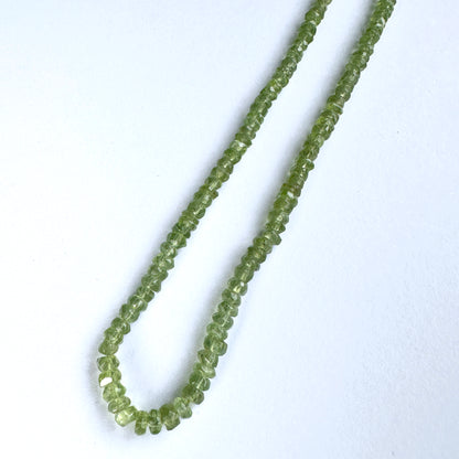Handmade jewellery components made from 4mm Peridot beads with 0.5mm drilled holes.