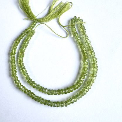 Natural gemstone beads featuring Peridot with precision faceting and vibrant green tones.