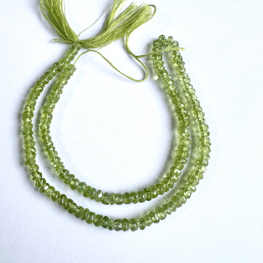 Natural gemstone beads featuring Peridot with precision faceting and vibrant green tones.