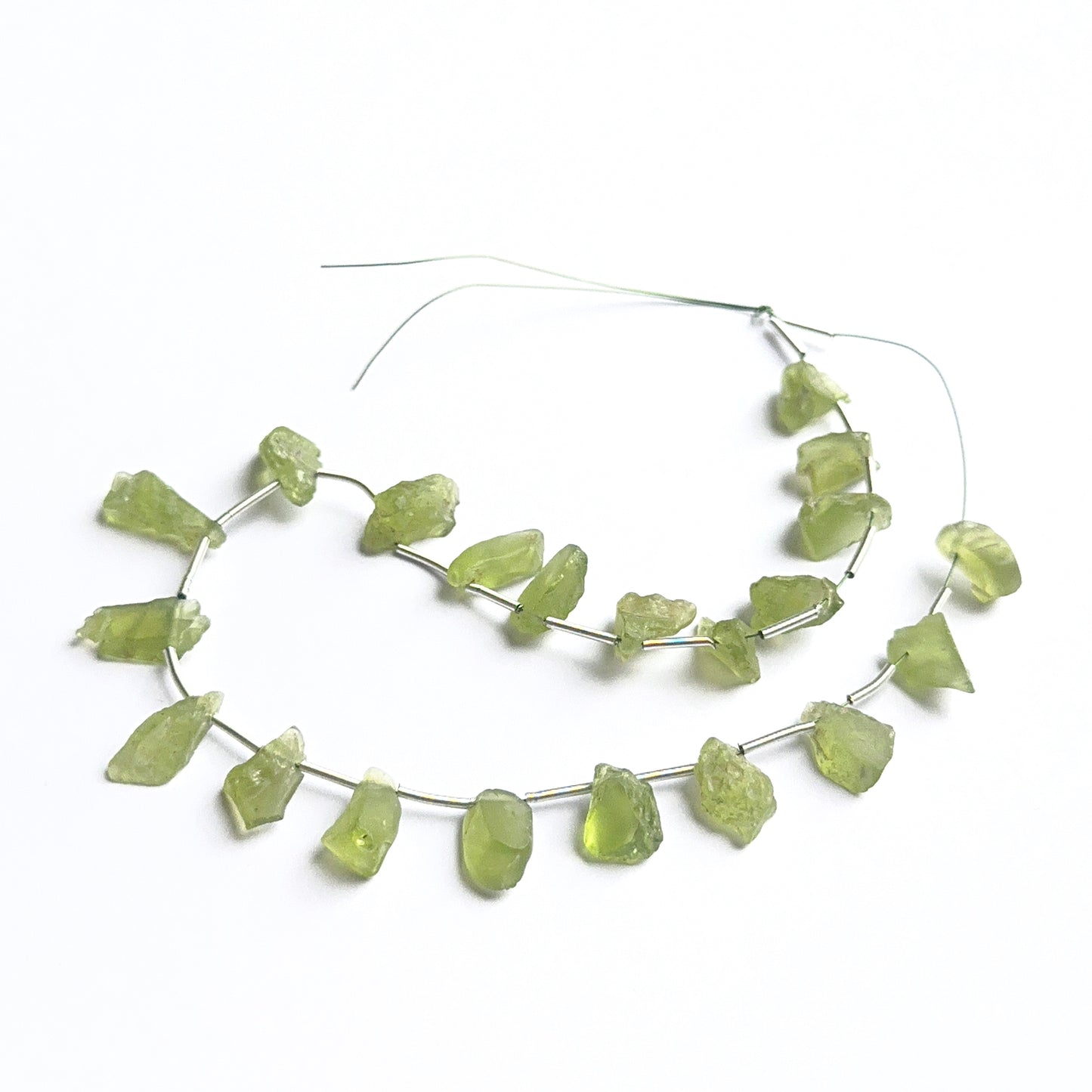 Faceted amethyst beads displayed with shimmering surfaces ideal for natural gemstone jewellery making.