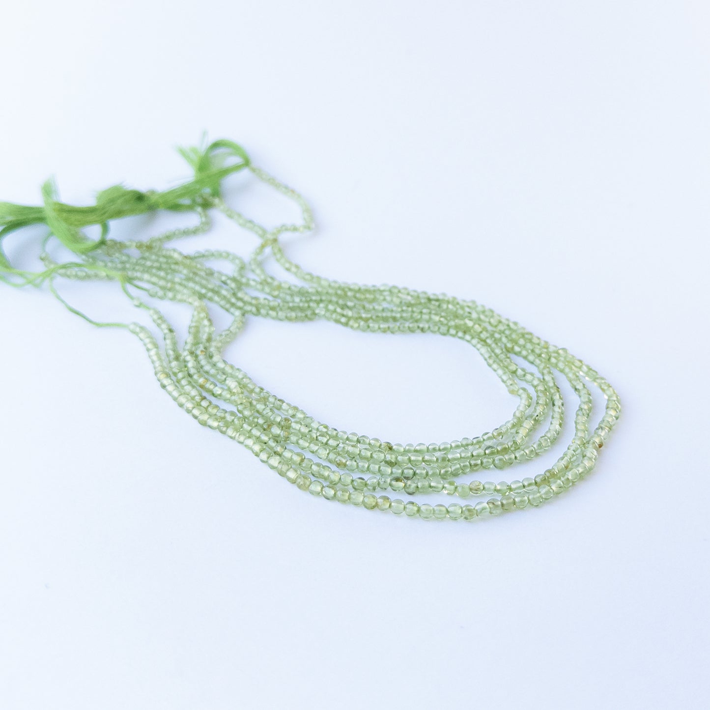 Authentic Peridot stone beads, 2.8mm smooth rounds ideal for handmade jewellery components.