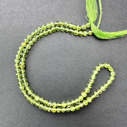 Natural gemstone beads in Peridot, 3.5mm size, ideal for fresh and elegant DIY jewellery designs.