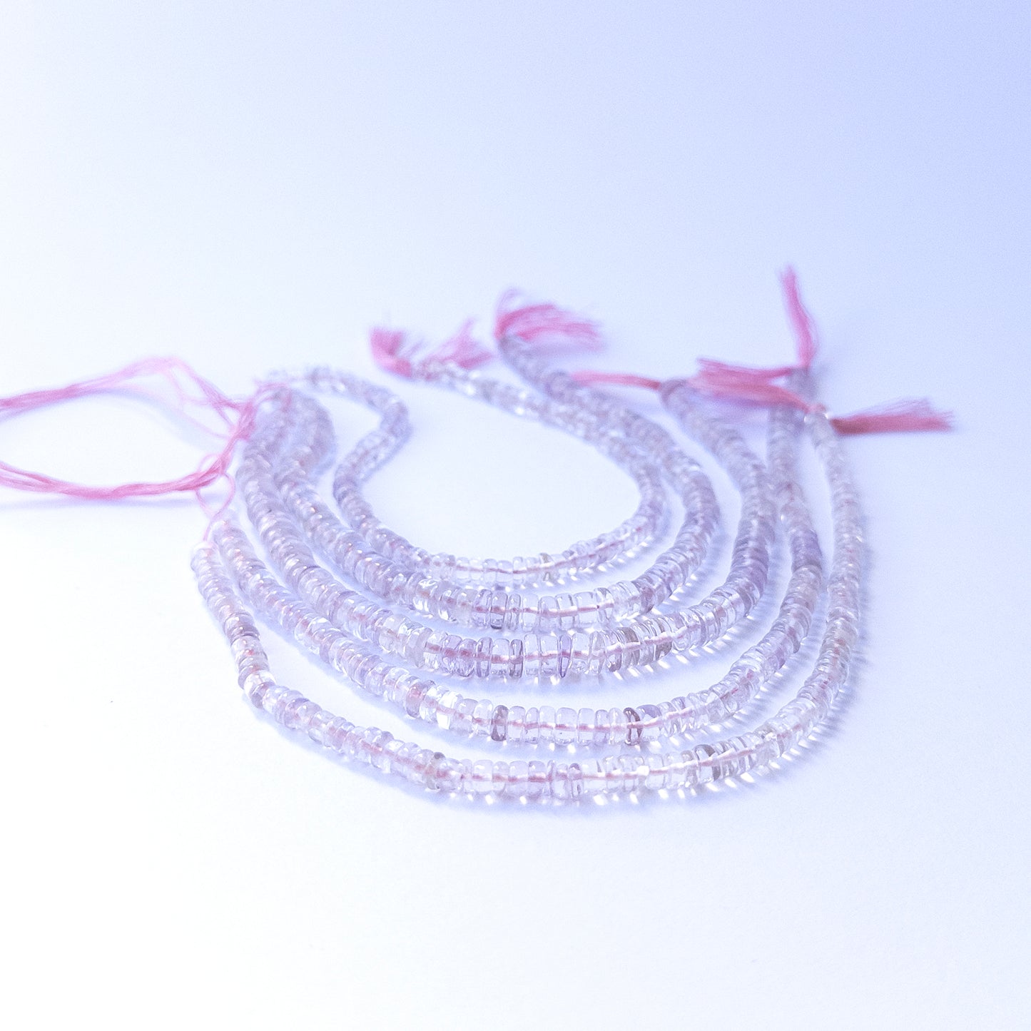 Pink Amethyst smooth wheel beads in 4.3–6mm size on a 21cm strand, showcasing genuine gemstone shine for handmade jewellery.