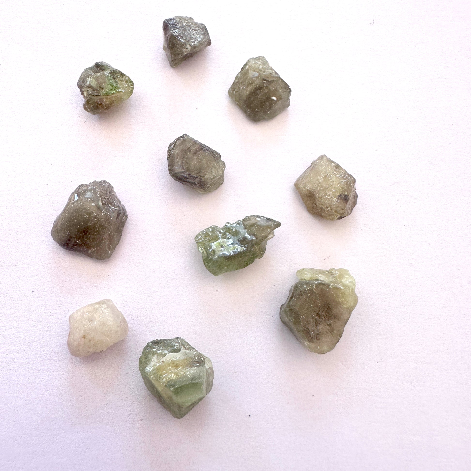 Assorted sapphire gemstones with rich colour and undrilled finish for custom jewellery.