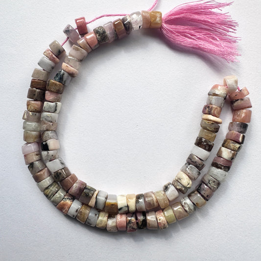 Natural gemstone beads featuring Pink Opal discs with polished finish and consistent cut.