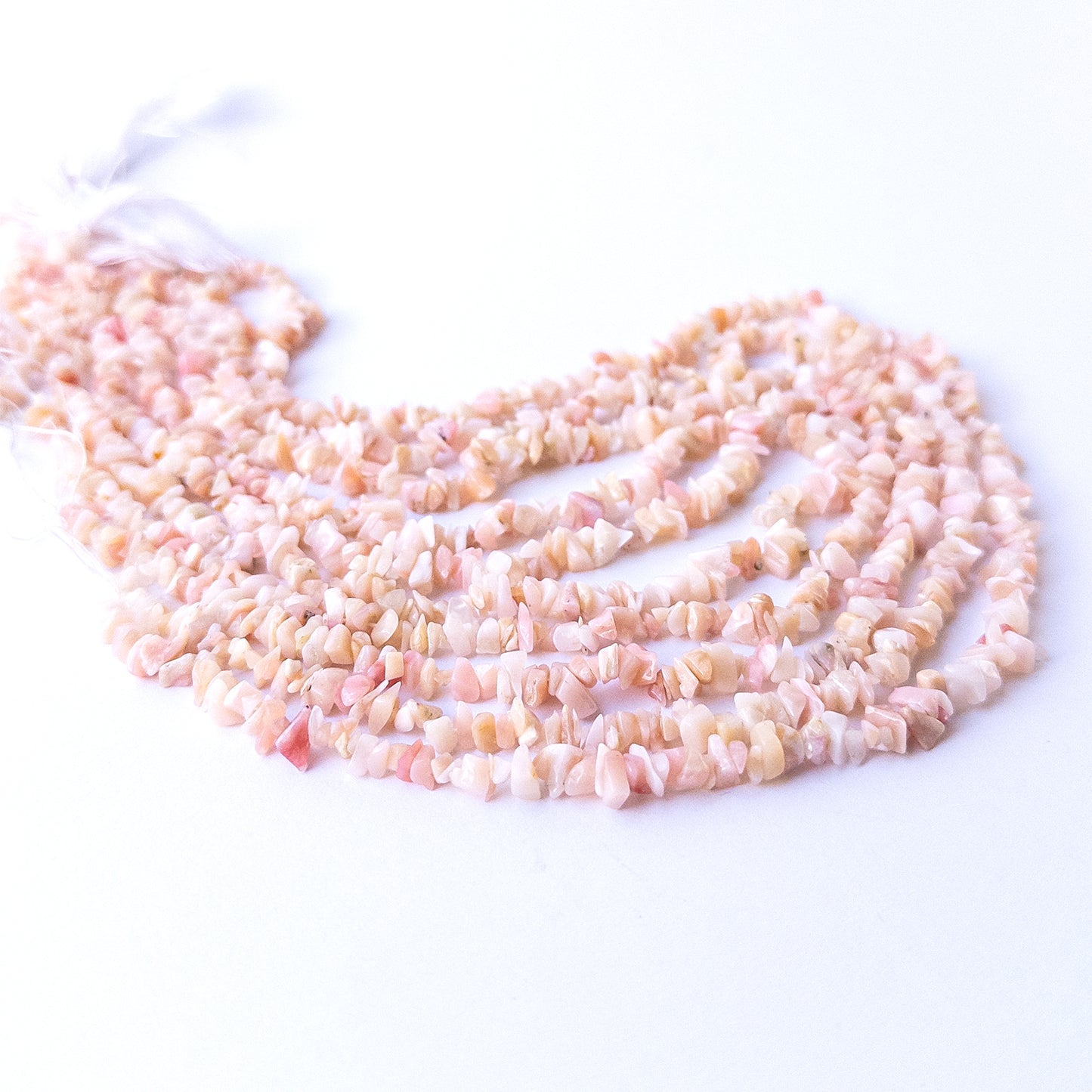 Genuine Pink Peruvian Opal stone beads in natural chip form with gentle blush colour ideal for DIY jewellery making.