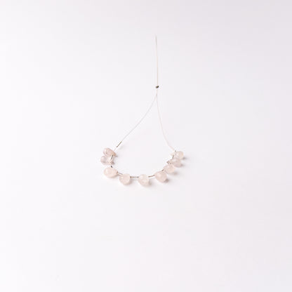 High quality Pink Quartz stone beads showcasing subtle pink hues and precision faceting for added brilliance.