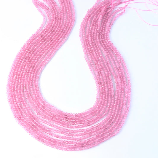 Pink Quartz faceted rondelle gemstone beads showing soft pink tones and subtle sparkle.