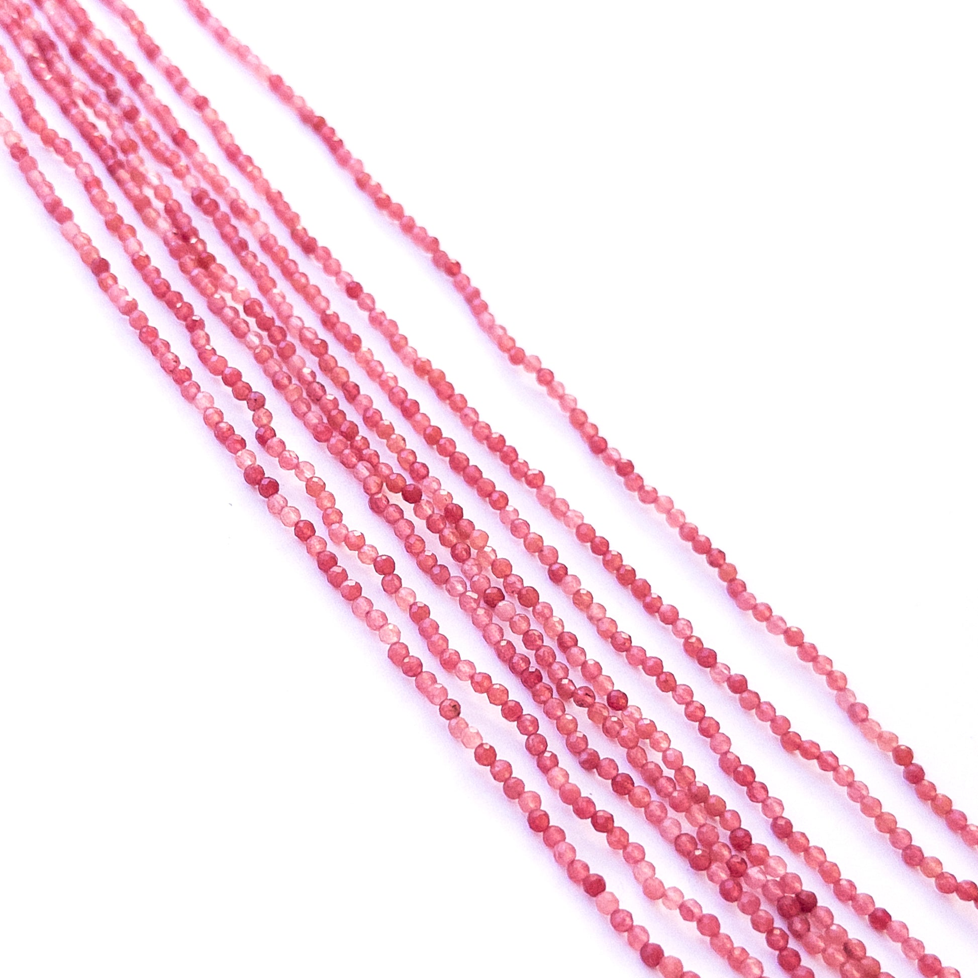 Authentic Strawberry Quartz gemstone beads showing soft pink tones and sparkle for artisan beadwork.