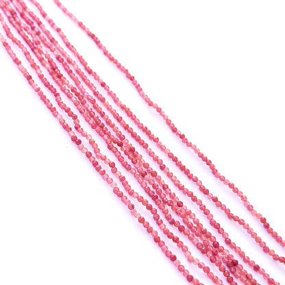 Authentic Strawberry Quartz gemstone beads showing soft pink tones and sparkle for artisan beadwork.