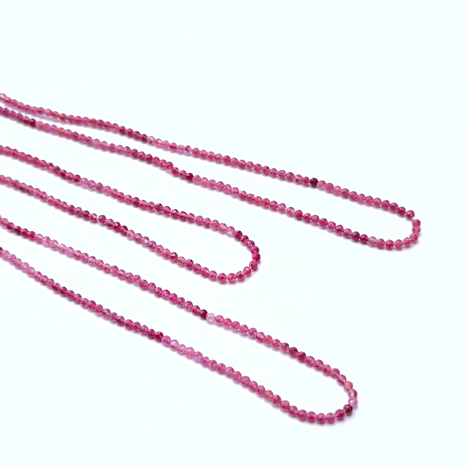 Pink Tourmaline faceted rondelle natural gemstone beads in 2.2mm on a 33cm strand, showing bright pink sparkle for DIY jewellery.