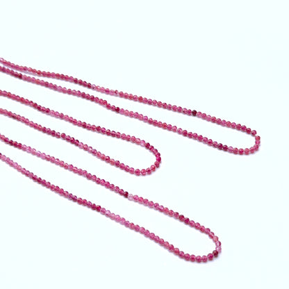 Pink Tourmaline faceted rondelle natural gemstone beads in 2.2mm on a 33cm strand, showing bright pink sparkle for DIY jewellery.