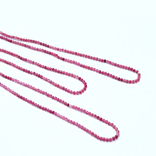 Pink Tourmaline faceted rondelle natural gemstone beads in 2.2mm on a 33cm strand, showing bright pink sparkle for DIY jewellery.