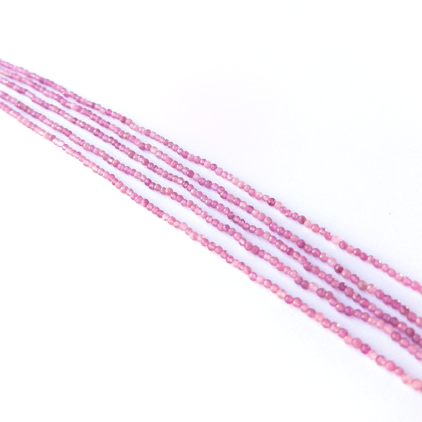 Handmade jewellery components featuring authentic Pink Tourmaline faceted rondelle beads with bright pink sparkle.