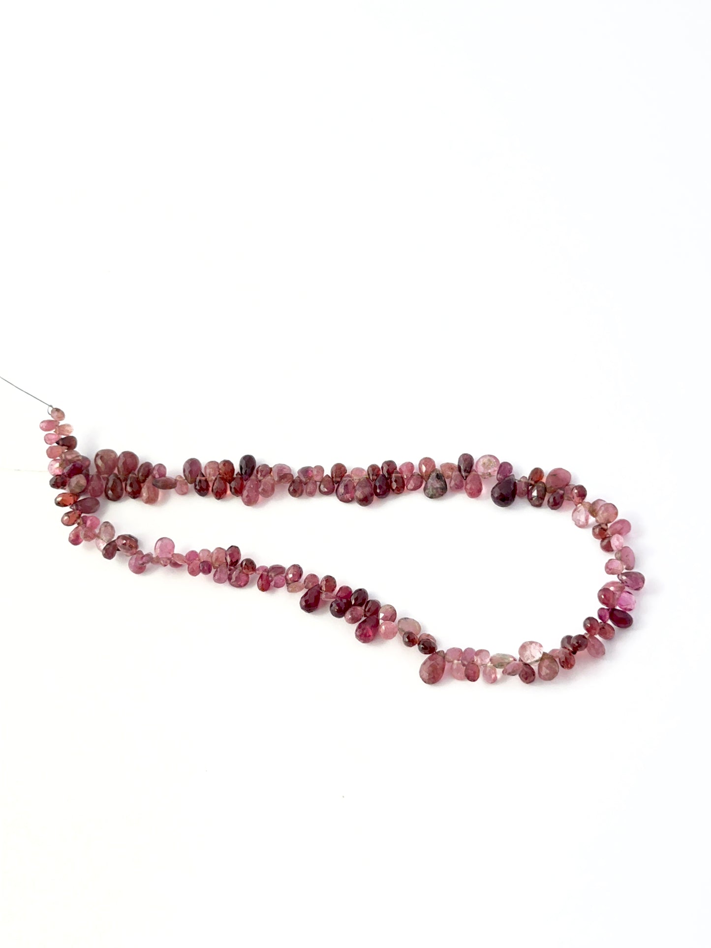 Authentic pink tourmaline gemstone beads with a polished faceted finish, ideal for elegant handmade jewellery designs.