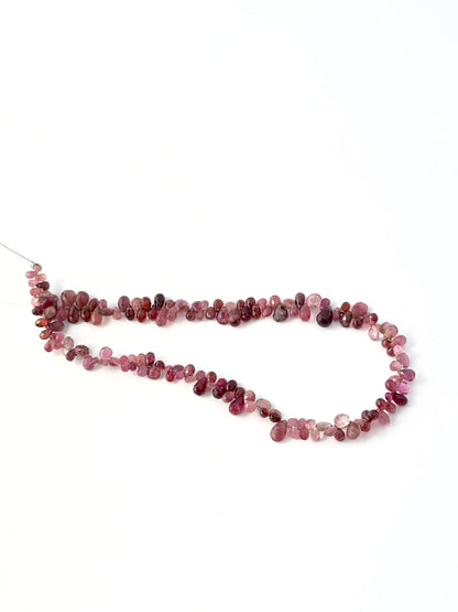 Authentic pink tourmaline gemstone beads with a polished faceted finish, ideal for elegant handmade jewellery designs.