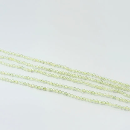 32cm strand of small faceted Prehnite rondelle beads for delicate jewellery designs.
