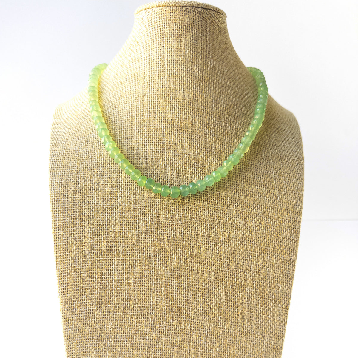 Prehnite faceted rondelle necklace 7.5mm showing soft green tones and sparkling translucency in a 43cm design.