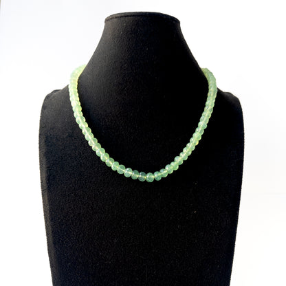Authentic Prehnite gemstone necklace displaying natural colour, refined faceting, and premium clarity.